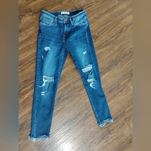 Distressed Blue Jeans
